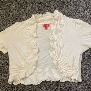 Creme colored shrug.